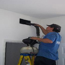 Specialist Cleaning Overhead HVAC Vent